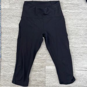 Lululemon size 6 black crop leggings with mesh detail on sides